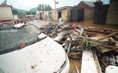 বেইজিংয়ে ভারী বৃষ্টি ও বন্যায় ৩৮ জনের মৃত্যু 